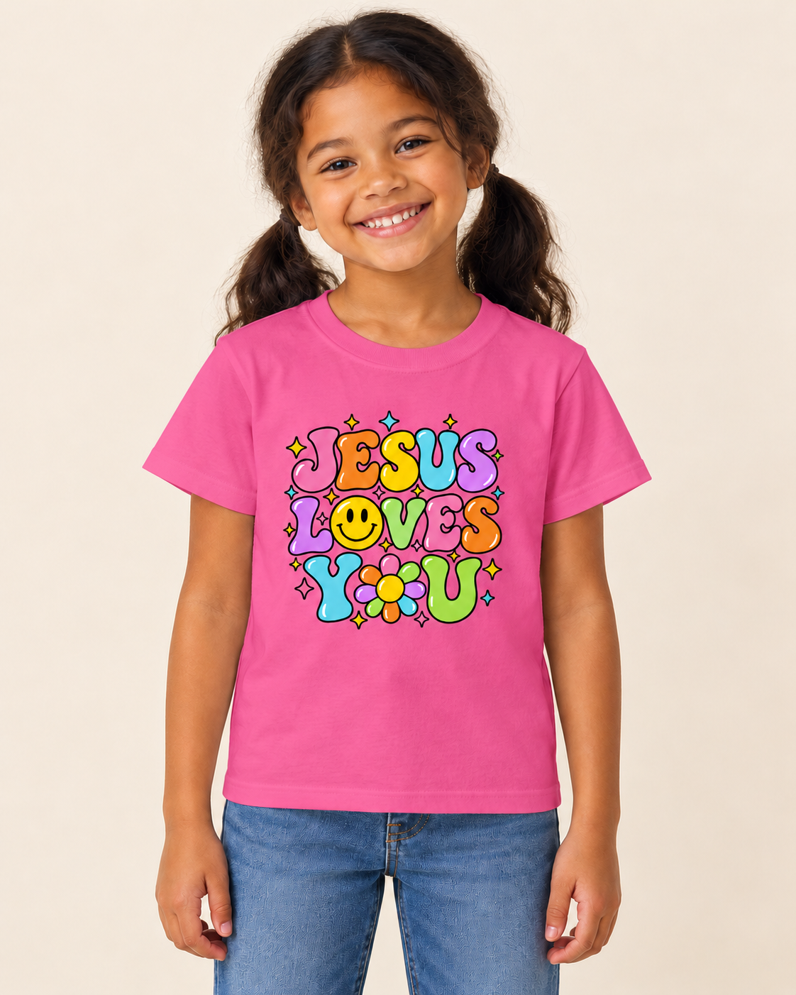 Girl wearing Jesus Loves You T-shirt in Pink
