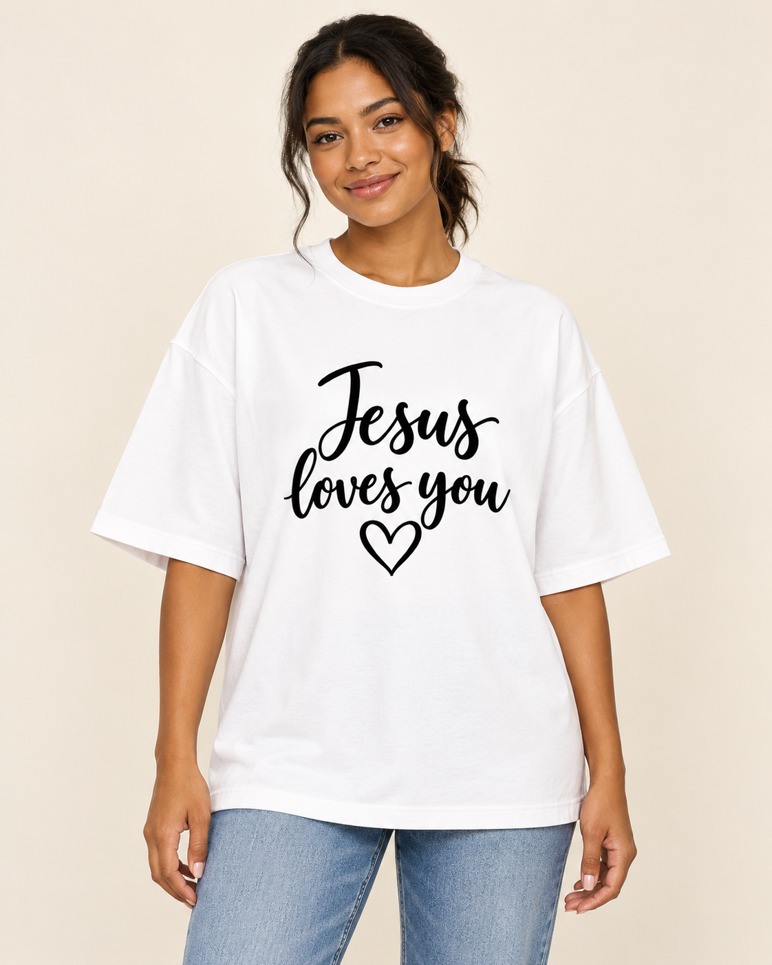 Model wearing the white oversized Jesus Loves You jersey